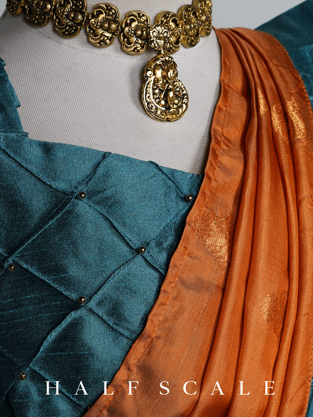 Orange Nauvari Saree with Blue Frills