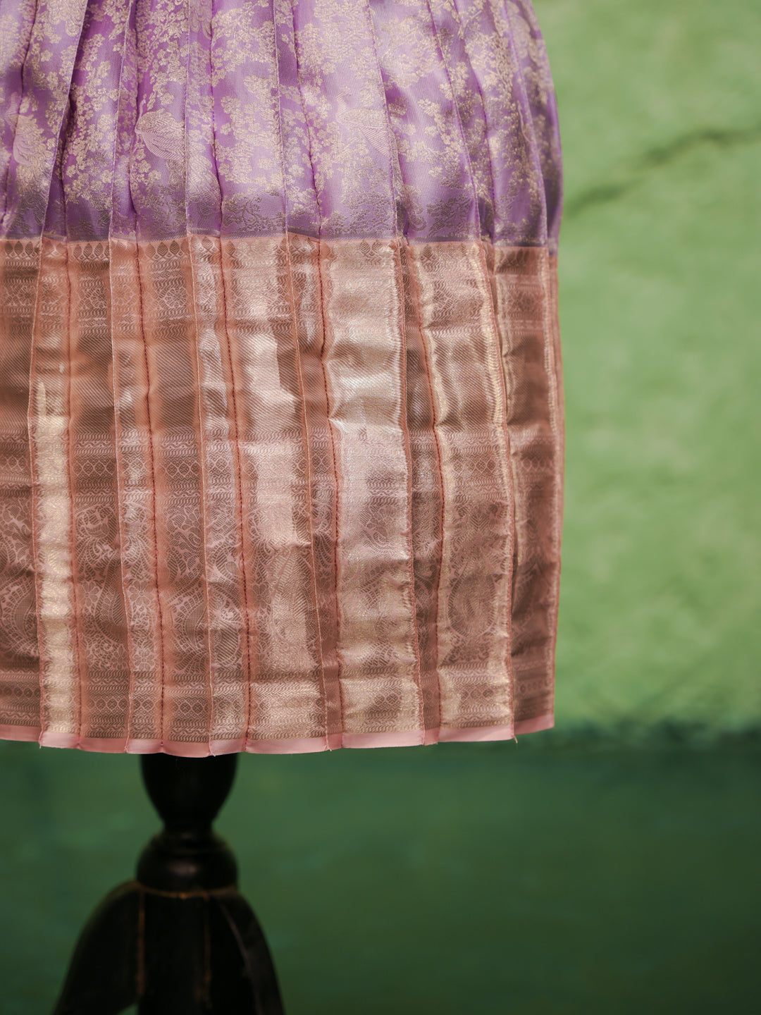 Lavender and pink pattu pavadai in pure Kanchipuram silk with zari border and beaded neckline — close up border view