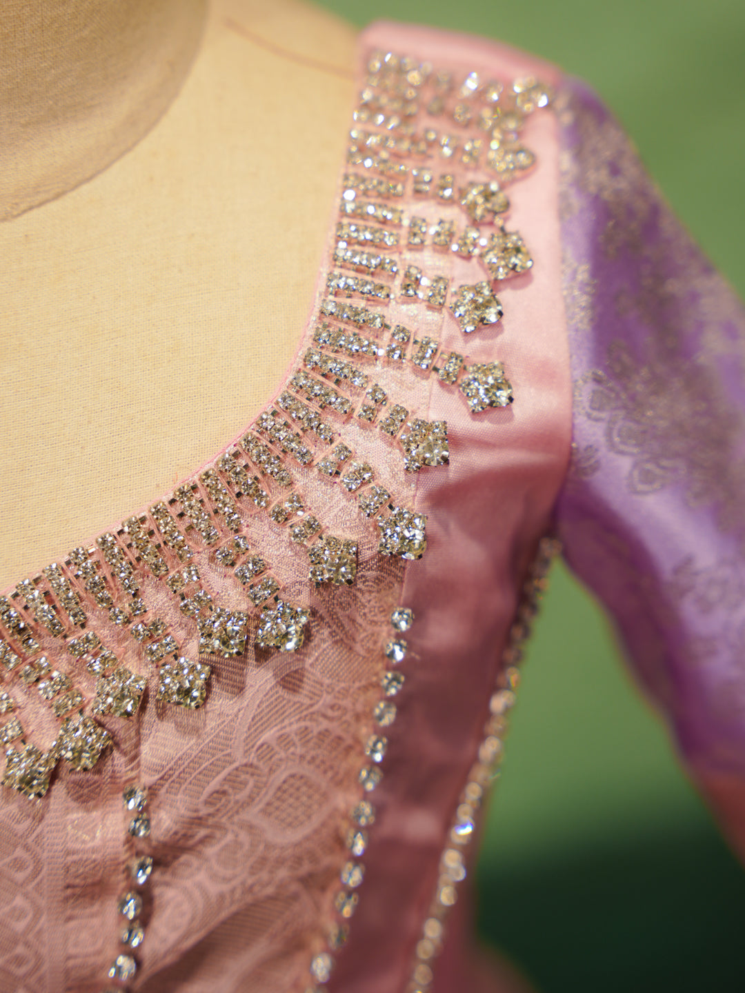 Lavender and pink pattu pavadai in pure Kanchipuram silk with zari border and beaded neckline — neckline embroidery