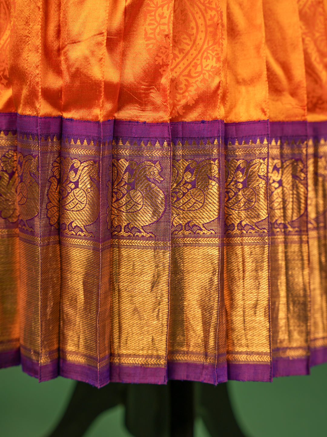 Royal Purple & Orange Silk Pavadai Set – Pleated Asymmetrical Blouse & Grand Zari Border
