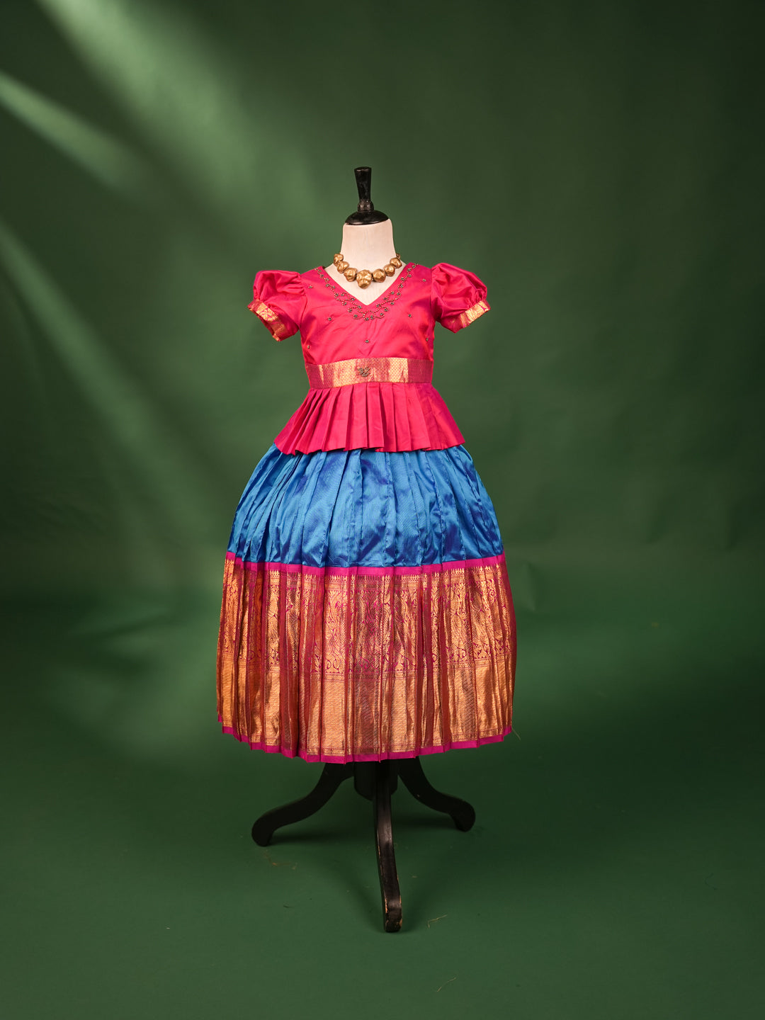 Elegant Pink Pleated Peplum Blouse with Royal Blue & Gold Zari Border Pattu Pavadai