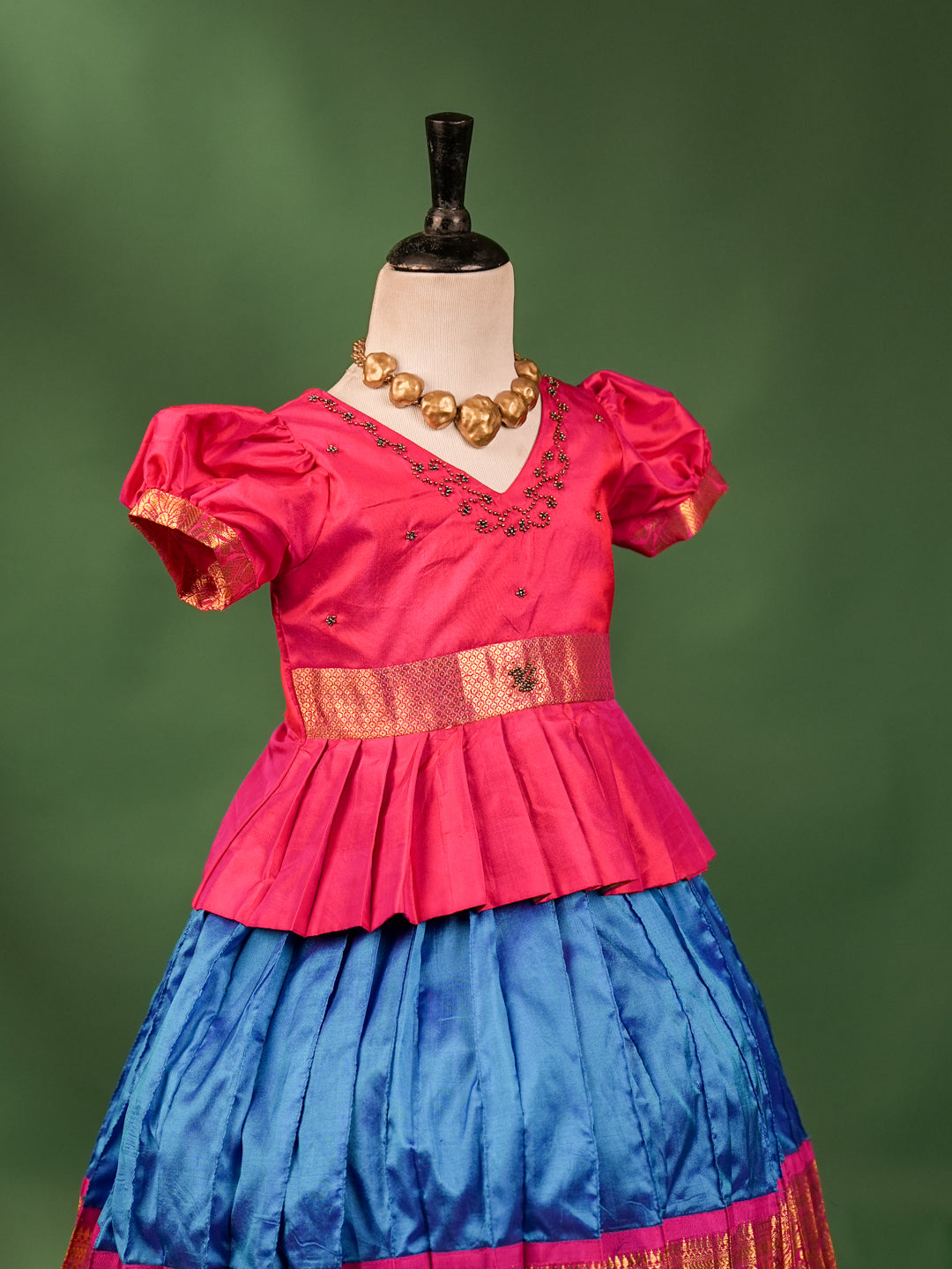 Elegant Pink Pleated Peplum Blouse with Royal Blue & Gold Zari Border Pattu Pavadai