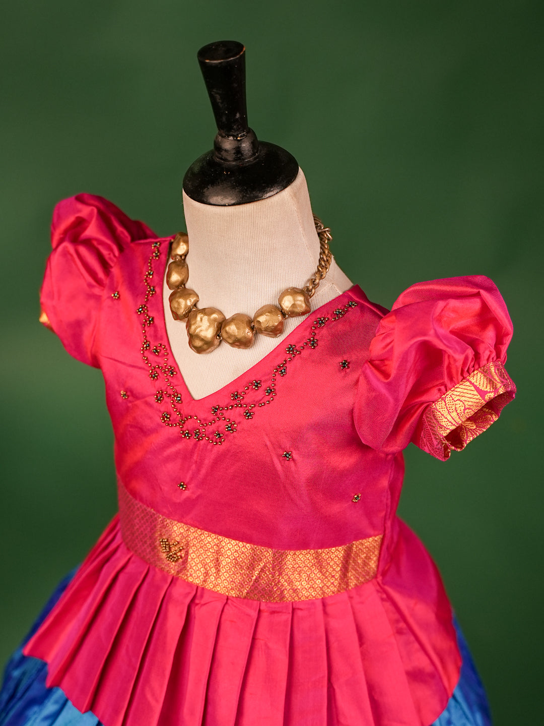 Elegant Pink Pleated Peplum Blouse with Royal Blue & Gold Zari Border Pattu Pavadai