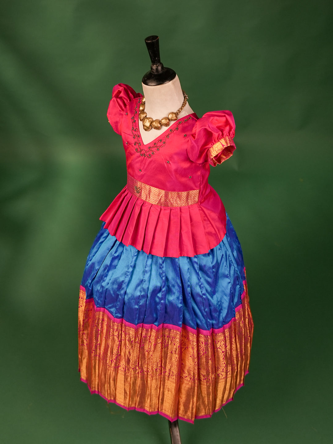 Elegant Pink Pleated Peplum Blouse with Royal Blue & Gold Zari Border Pattu Pavadai