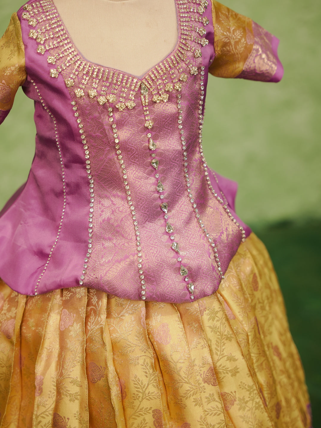 Lavender and gold pattu pavadai in pure Kanchipuram silk with zari skirt and embellished blouse — neckline