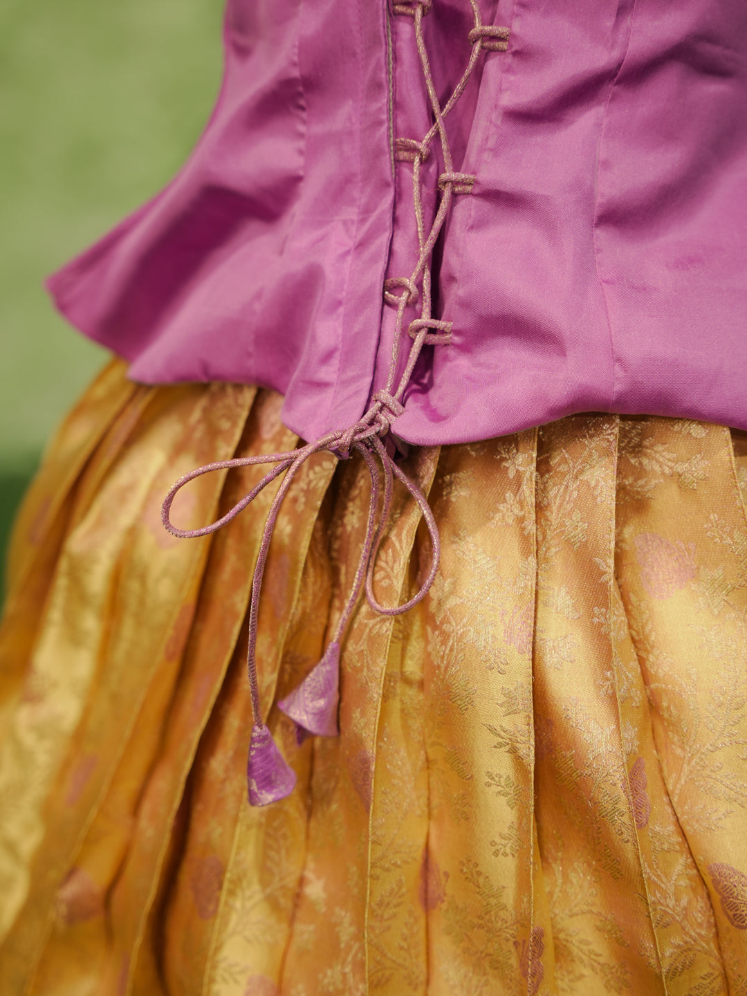 Lavender and gold pattu pavadai in pure Kanchipuram silk with zari skirt and embellished blouse — waist back