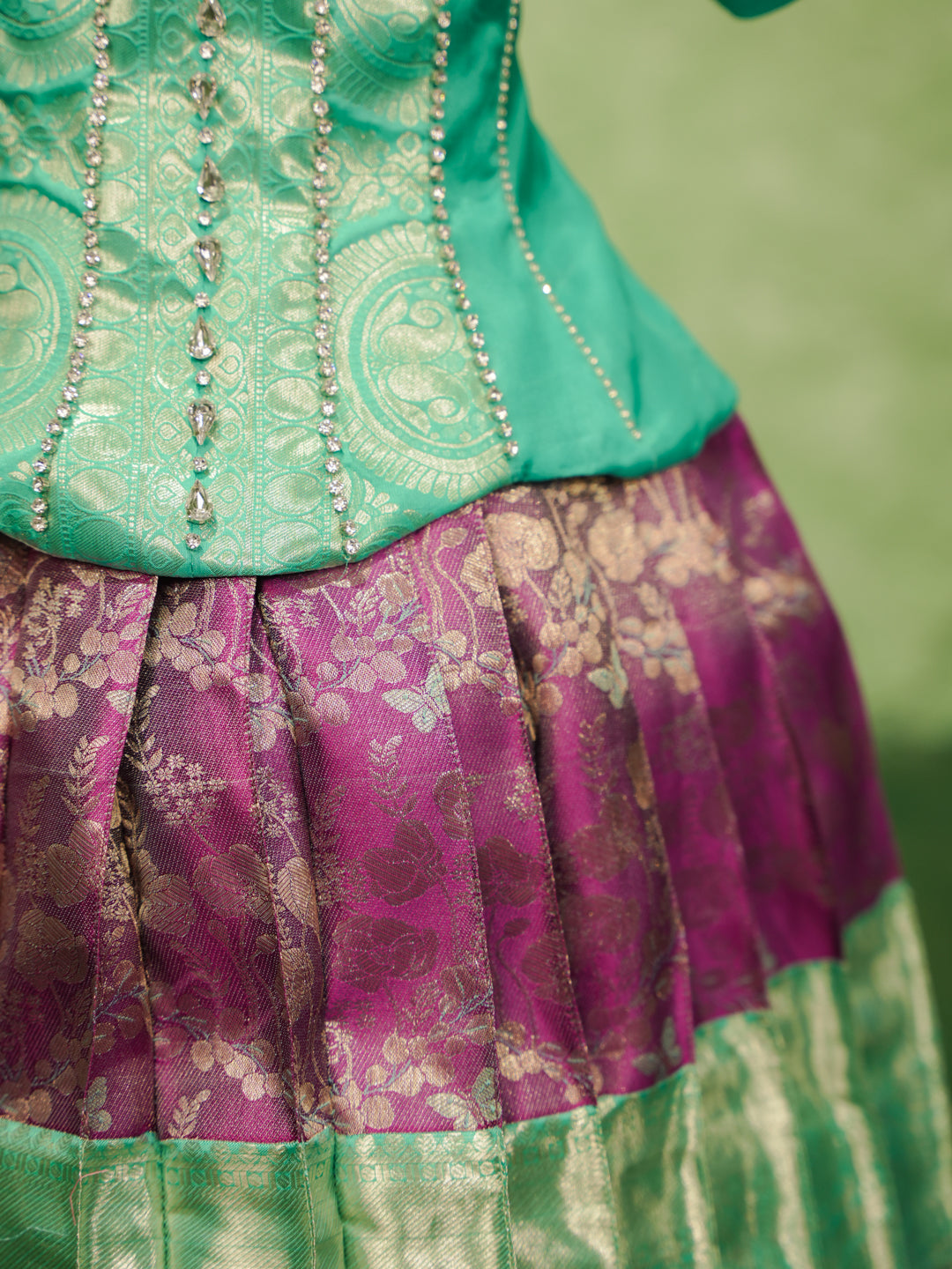 Mint and purple pattu pavadai in pure Kanchipuram silk with embellished blouse and zari skirt — waist