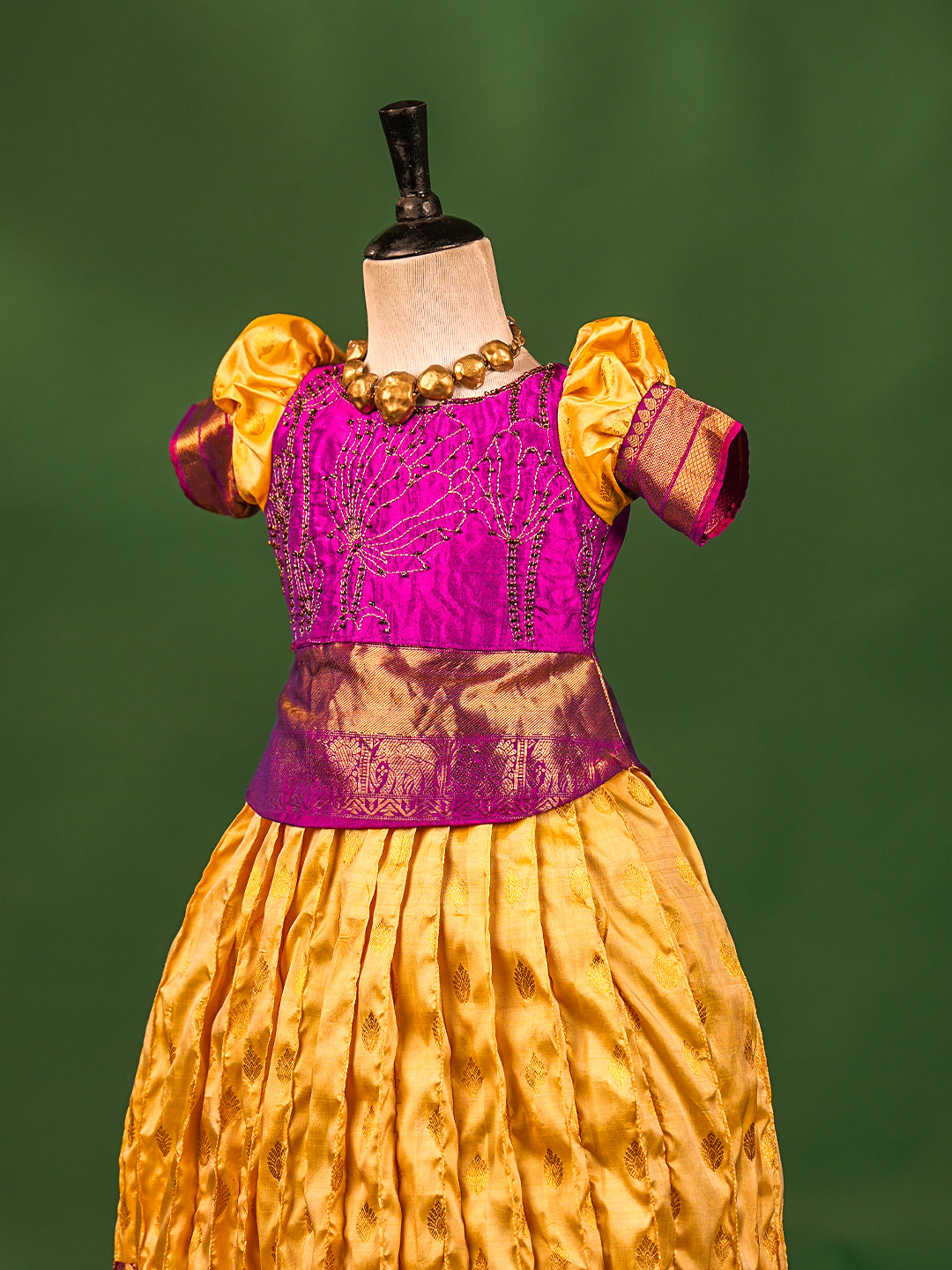 Royal Elegance Kanchipuram Silk Pattu Pavadai with Contrast Magenta Blouse & Heart Cut Back