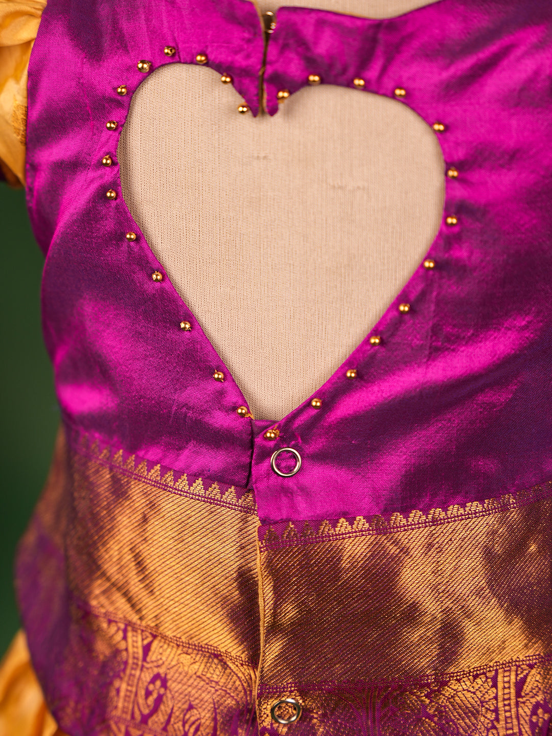 Royal Elegance Kanchipuram Silk Pattu Pavadai with Contrast Magenta Blouse & Heart Cut Back