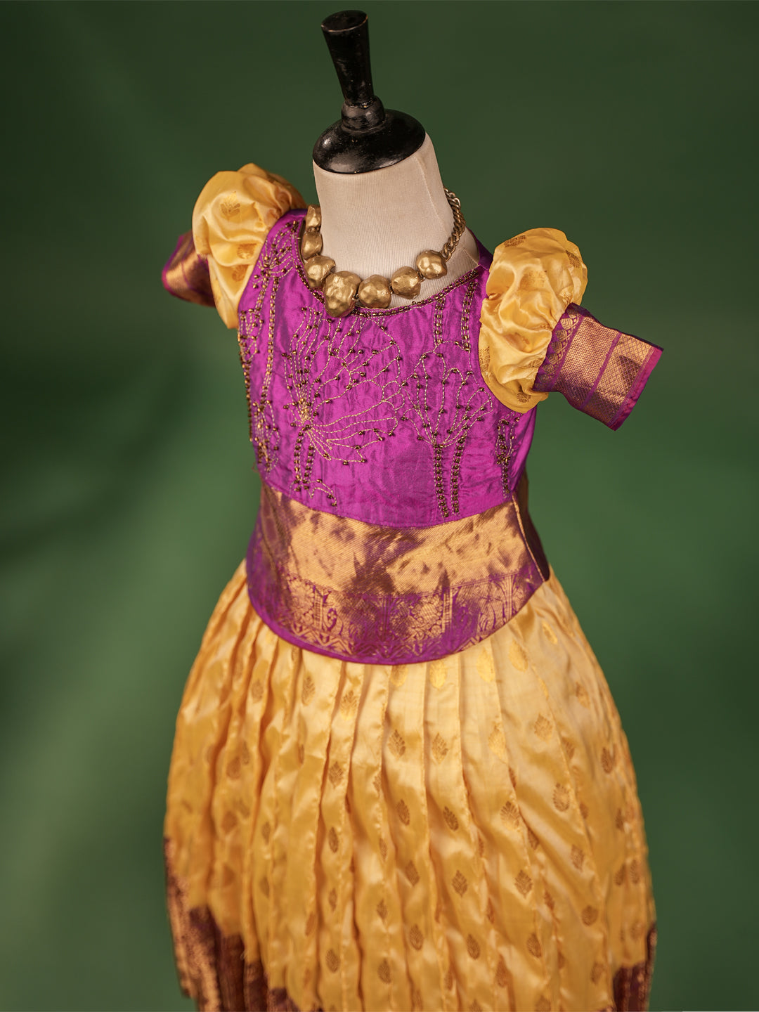 Royal Elegance Kanchipuram Silk Pattu Pavadai with Contrast Magenta Blouse & Heart Cut Back