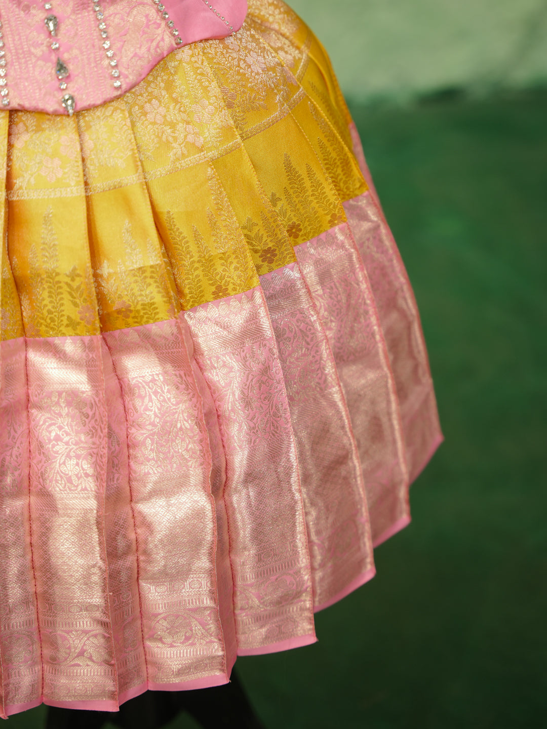 Pink and gold pattu pavadai in pure Kanchipuram silk with embellished blouse and zari skirt — skirt border