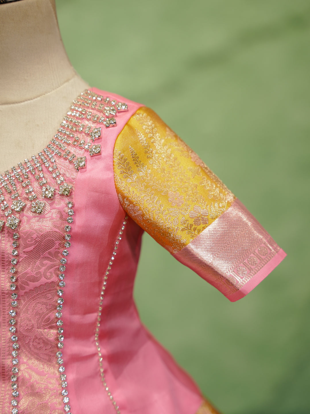 Pink and gold pattu pavadai in pure Kanchipuram silk with embellished blouse and zari skirt — sleeve