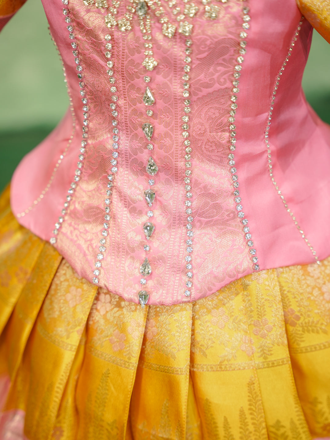 Pink and gold pattu pavadai in pure Kanchipuram silk with embellished blouse and zari skirt — waist