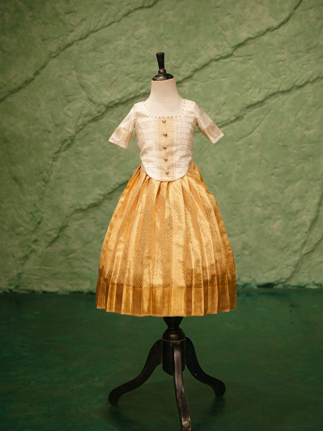 Pure Kanchipuram silk pattu pavadai for girls in ivory blouse and golden zari skirt-1