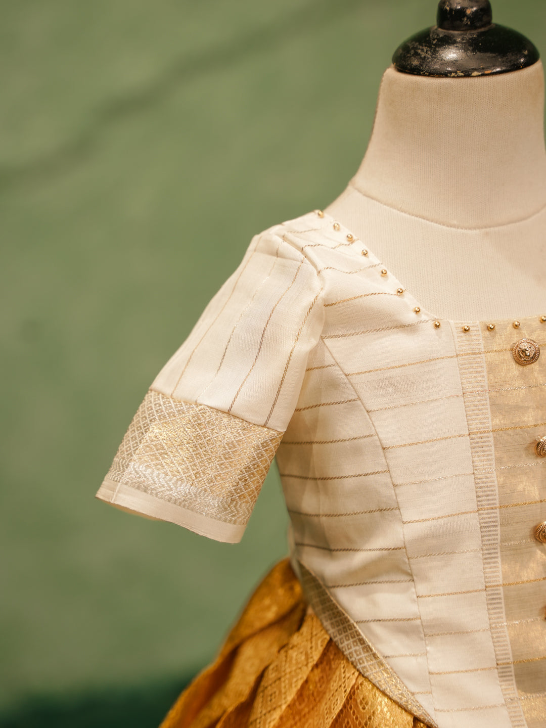 Pure Kanchipuram silk pattu pavadai for girls in ivory blouse and golden zari skirt-3