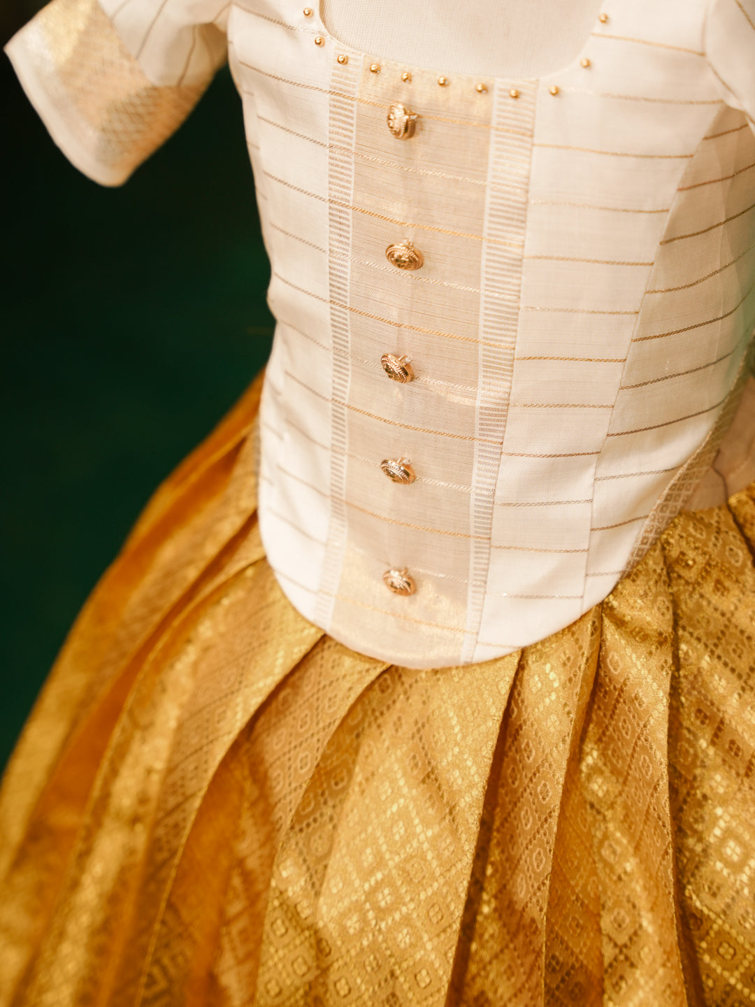 Pure Kanchipuram silk pattu pavadai for girls in ivory blouse and golden zari skirt-6