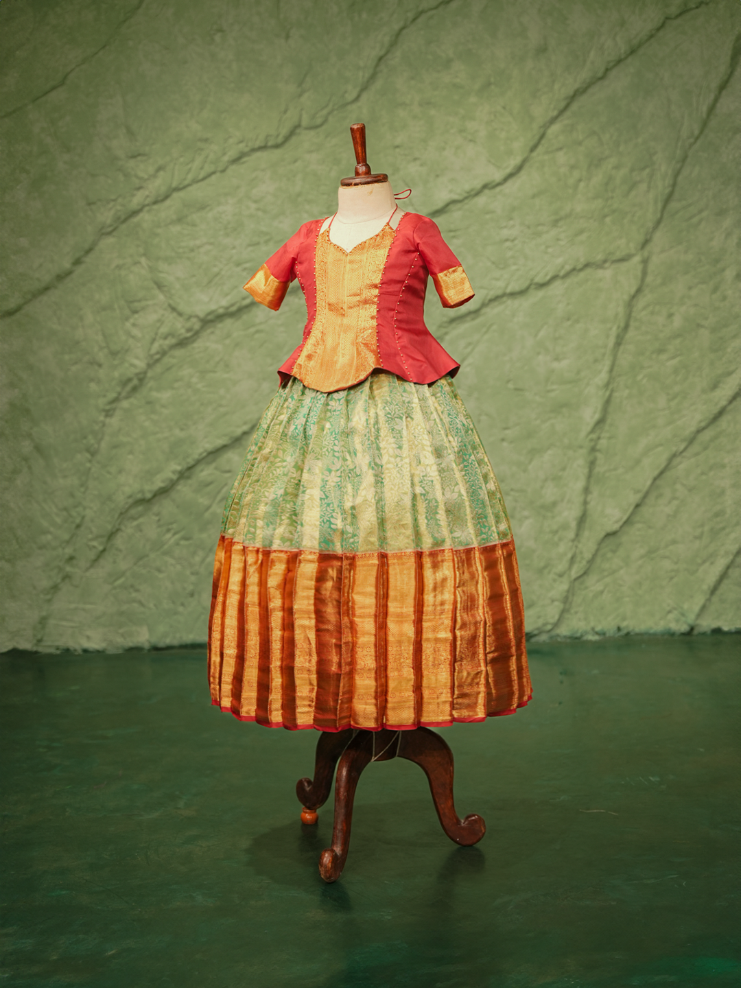 Pure Kanchipuram silk pattu pavadai for girls in ruby red blouse and turquoise green skirt with golden zari border-1