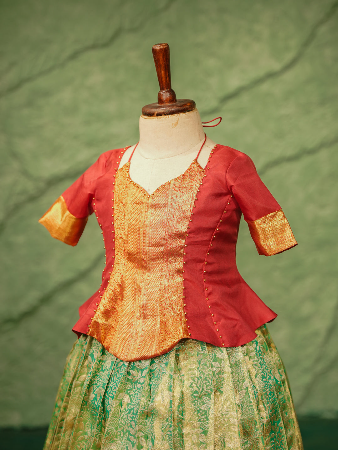 Pure Kanchipuram silk pattu pavadai for girls in ruby red blouse and turquoise green skirt with golden zari border-2