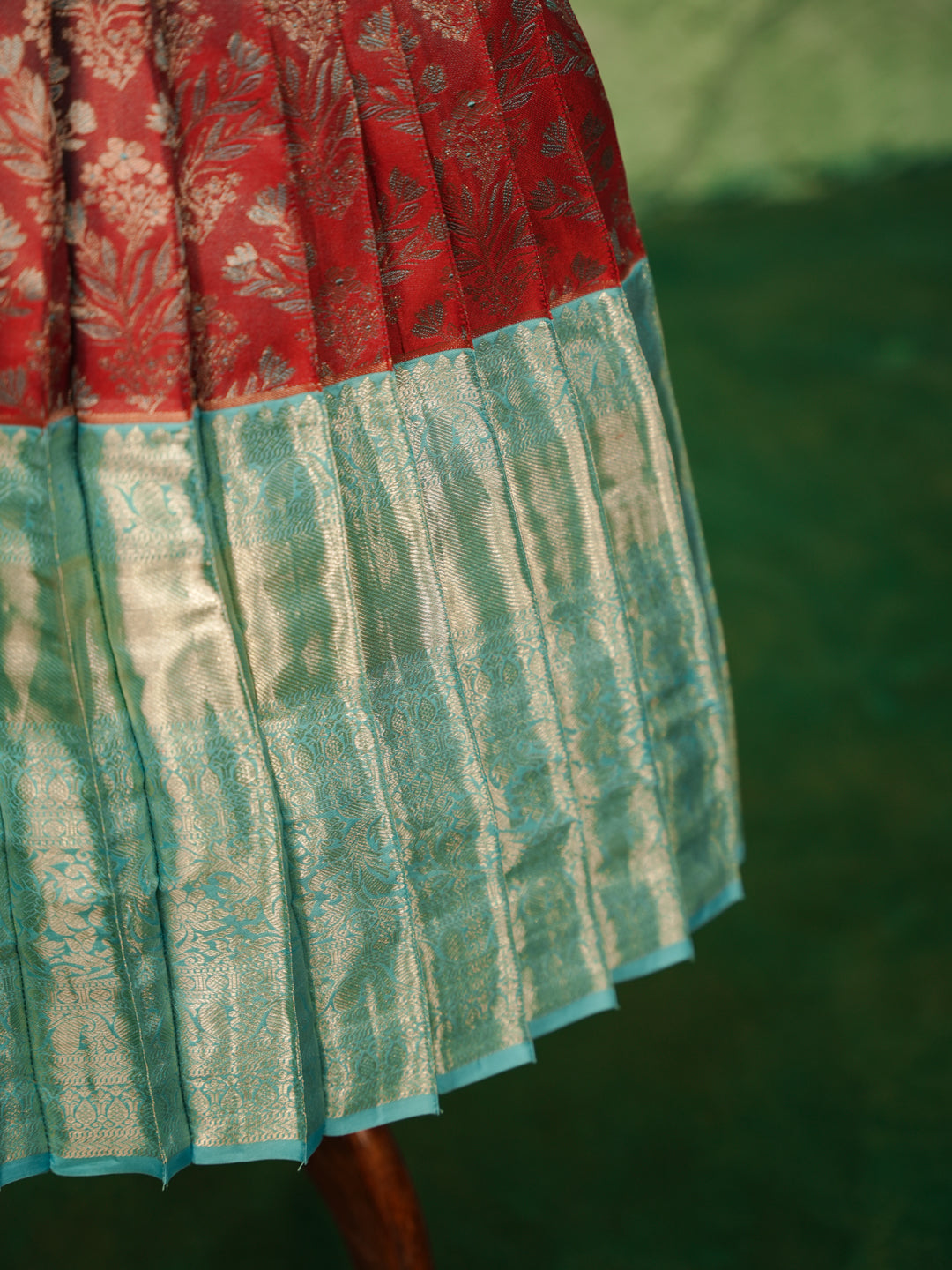 Sky blue and maroon pattu pavadai in pure Kanchipuram silk with zari skirt and beadwork blouse — skirt border