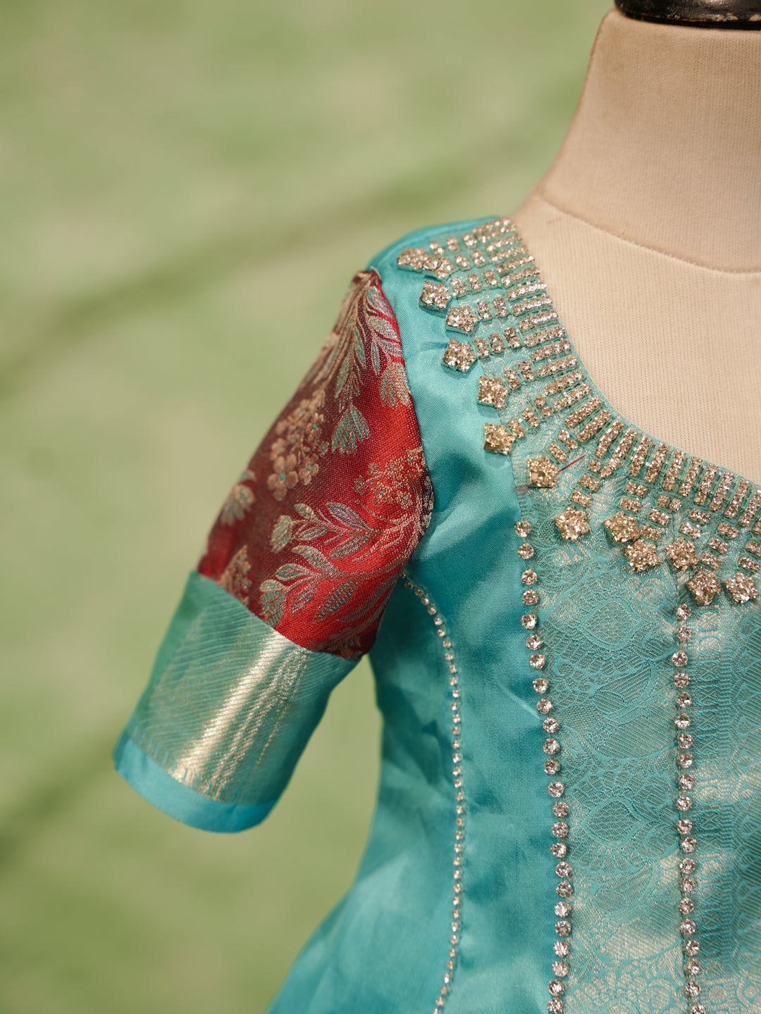Sky blue and maroon pattu pavadai in pure Kanchipuram silk with zari skirt and beadwork blouse — sleeve