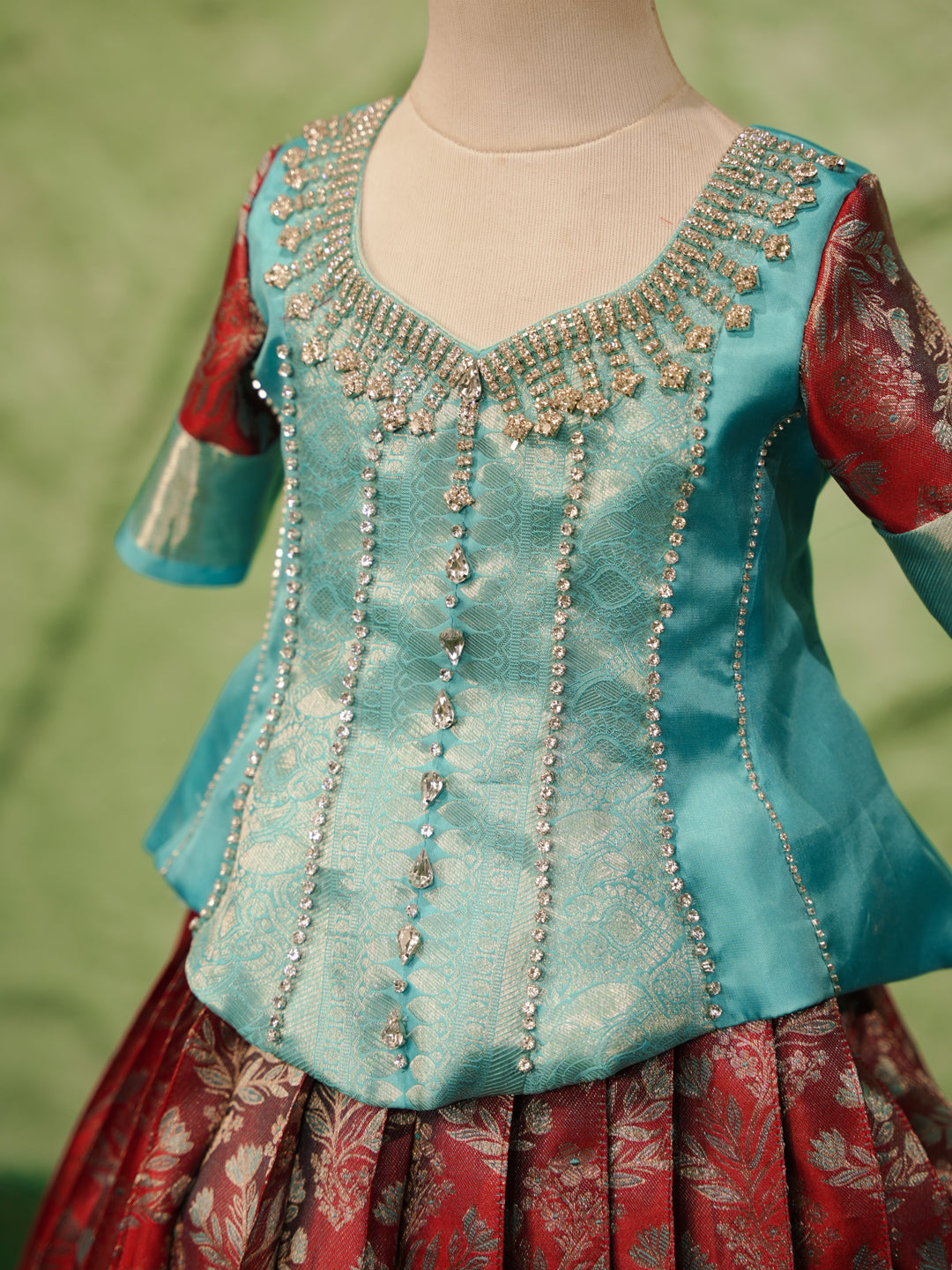 Sky blue and maroon pattu pavadai in pure Kanchipuram silk with zari skirt and beadwork blouse — top embroidery