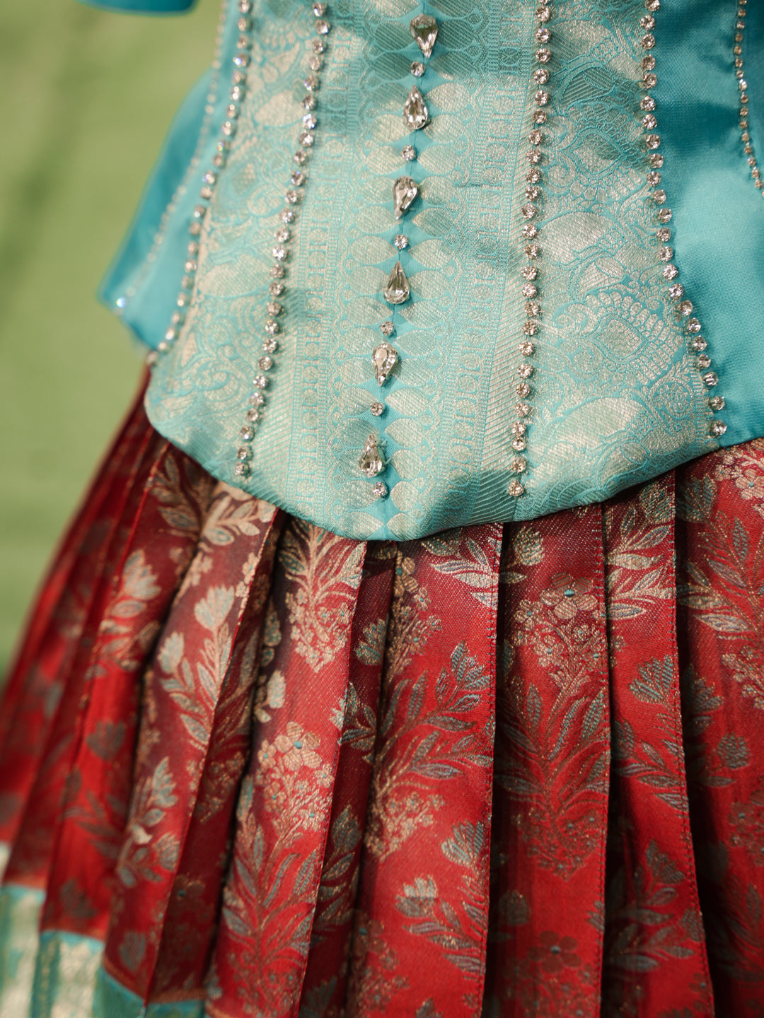 Sky blue and maroon pattu pavadai in pure Kanchipuram silk with zari skirt and beadwork blouse — waist line
