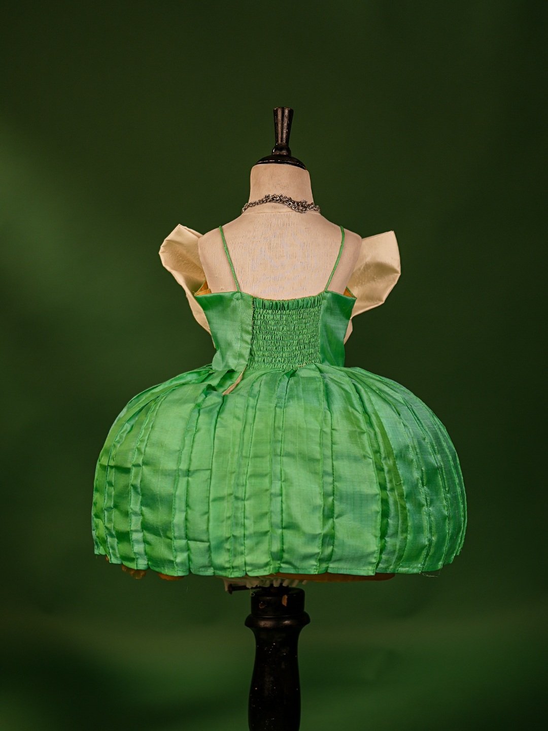 Turquoise Green & Buttermilk White Pure Kanchipuram Silk Gown – Sleeveless with Embroidered Bow