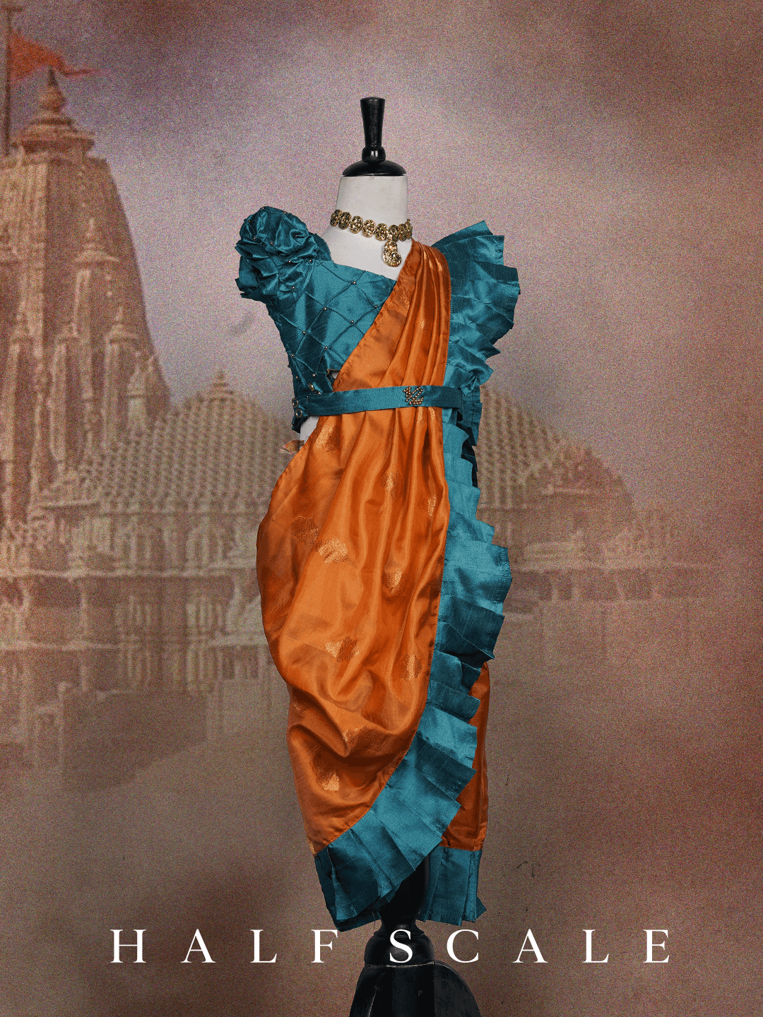Orange Nauvari Saree with Blue Frills