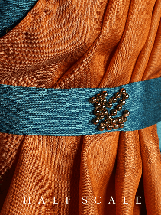 Orange Nauvari Saree with Blue Frills