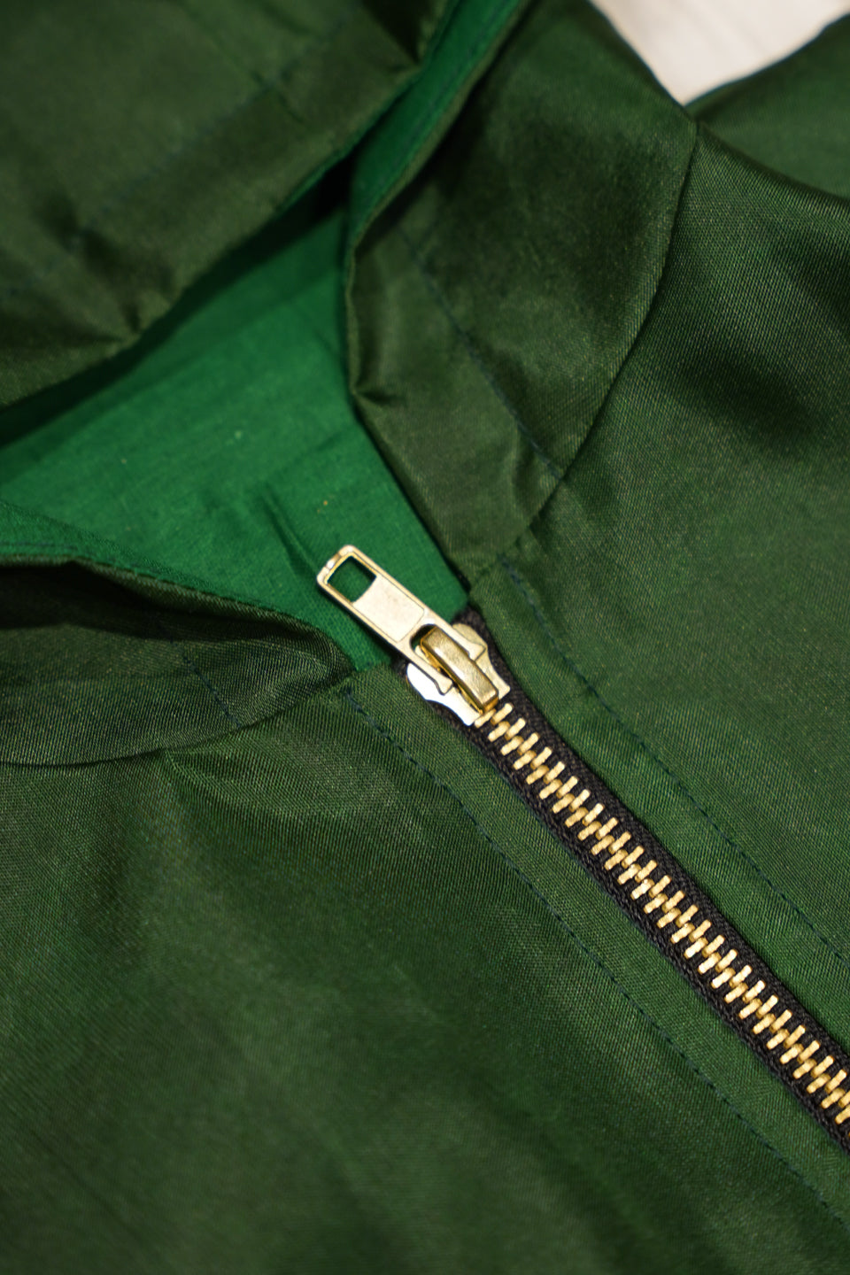 Emerald Green Newborn Hooded Jacket with Zari Motifs