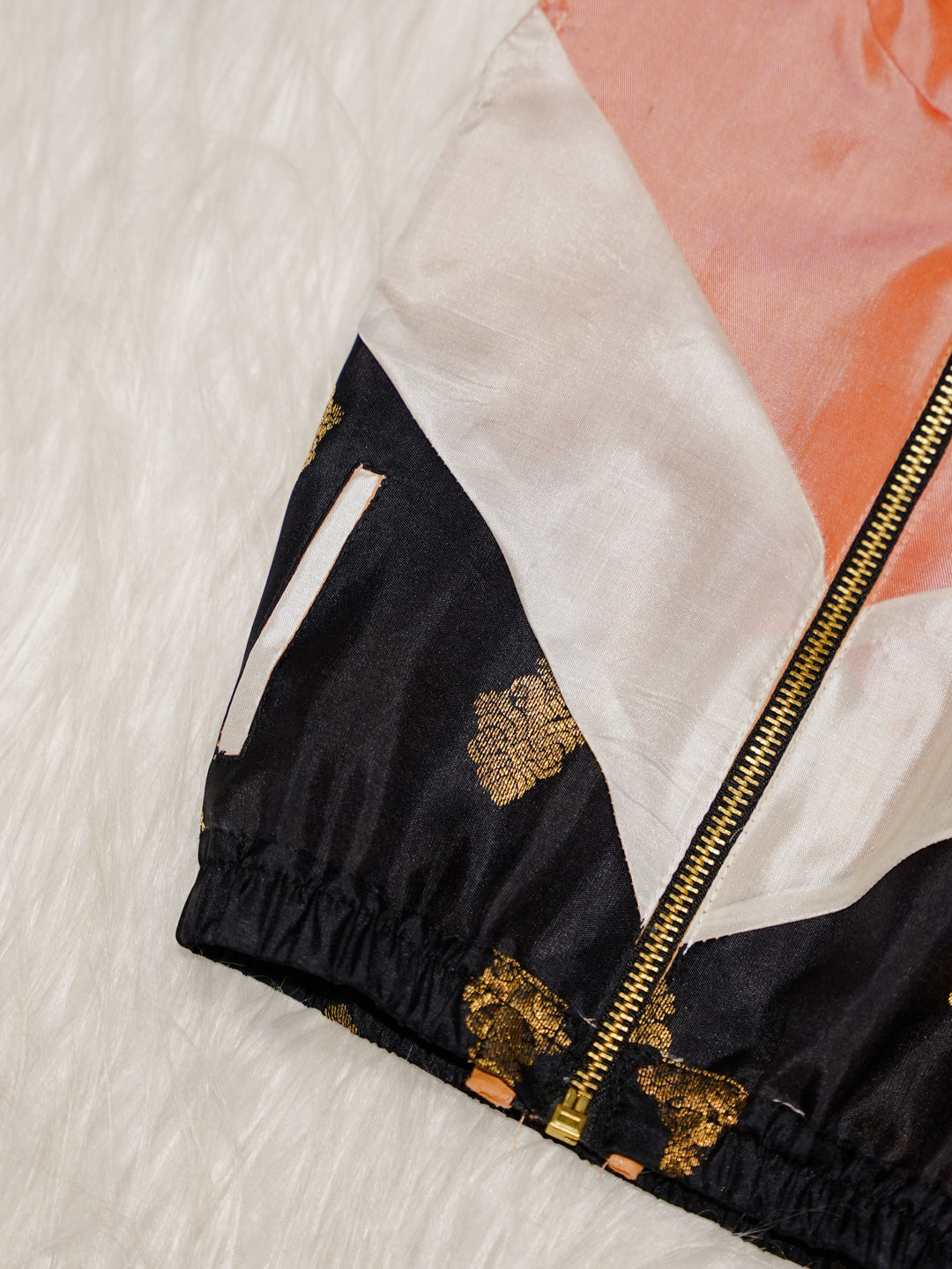 Peach Newborn Hooded Jacket with Zari Motifs